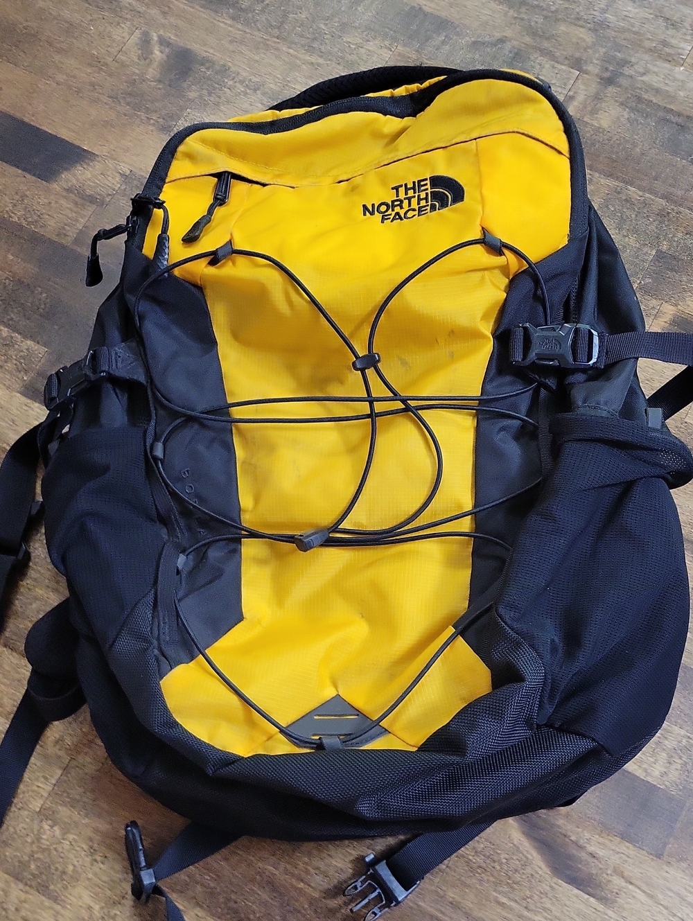 The North Face Men’s Yellow and Black Backpack Borealis